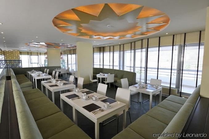 מנאמה Al Raya Suites Hotel מסעדה תמונה